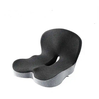The LiftPoint cushion — one molded piece with a seat cutout and a lumbar rise, grey knit cover.