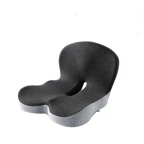 The LiftPoint cushion — one molded piece with a seat cutout and a lumbar rise, grey knit cover.