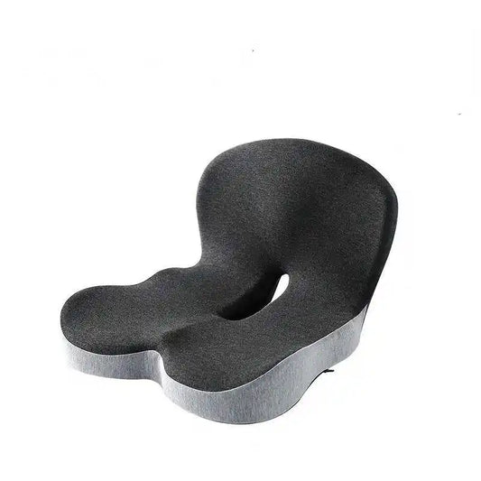 The LiftPoint cushion — one molded piece with a seat cutout and a lumbar rise, grey knit cover.